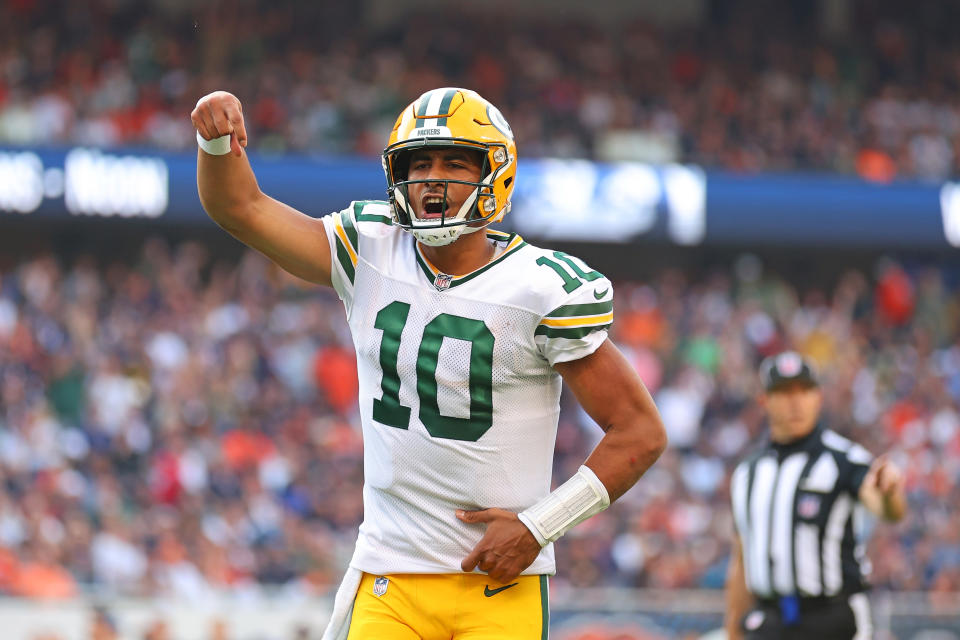 CHICAGO, ILLINOIS – SEPTEMBER 10: Jordan Love #10 of the Green Bay Packers celebrates a touchdown pass to Romeo Doubs (not pictured) against the Chicago Bears during the second half at Soldier Field on September 10, 2023 in Chicago, Illinois. (Photo by Michael Reaves/Getty Images)