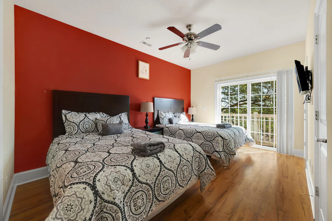 Bedroom at Motley Crew townhome in Central Myrtle Beach. Screenshot of listing. January 5, 2022.