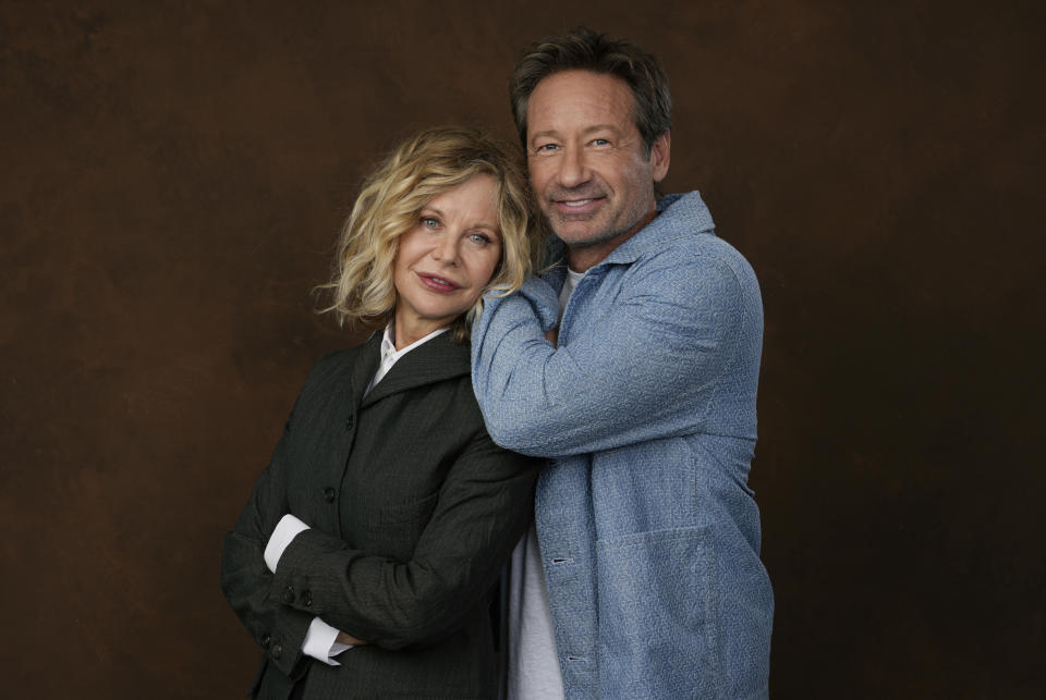 Actor-director Meg Ryan, left, poses with co-star David Duchovny at the Four Seasons Hotel in Los Angeles on Wednesday, Oct. 25, 2023, to promote their film "What Happens Later." (AP Photo/Chris Pizzello)