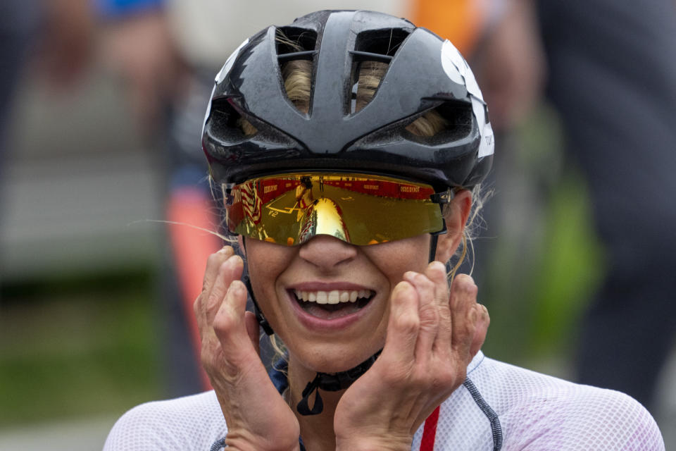 Oksana Masters, from USA, celebrates after wining at Women's H5 Road Race at the Fuji International Speedway at the Tokyo 2020 Paralympic Games, Wednesday, Sept. 1, 2021, in Tokyo, Japan. (AP Photo/Emilio Morenatti)