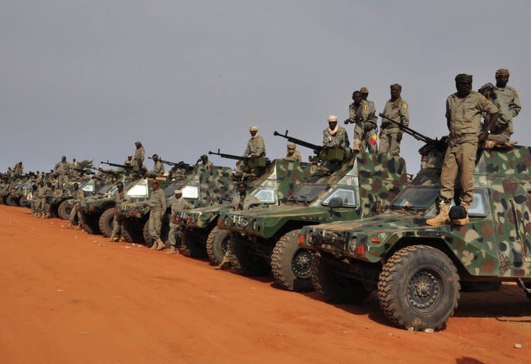 Chadian soldiers prepare to leave a military camp on the outskirts of Niamey, on their way to Mali, on January 24, 2013. France has said it has no intention of remaining in Mali for the long-term and that it is up to the Africans and to the Malians themselves to guarantee the country's security