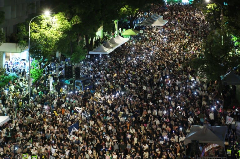 Tens of thousands gather outside parliament in Taipei to protest controversial bills proposed by opposition parties (Sam Yeh)