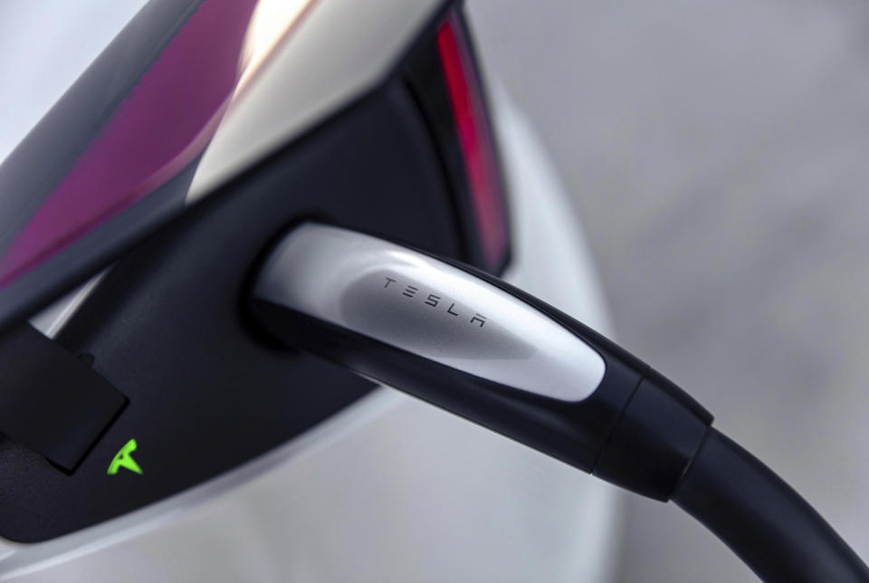 This photo provided by Tesla shows the North American Charge Standard, or NACS, a once-exclusive plug to Tesla that other automakers are now adopting. (Courtesy of Tesla Motors via AP)