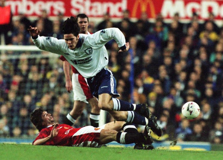 Manchester United’s Roy Keane (lying left) tackles Tottenham Hotspur’s Rory Allen during today’s (Sunday) FA Carling Premiership match at White Hart Lane. Photo by David Cheskin/PA.