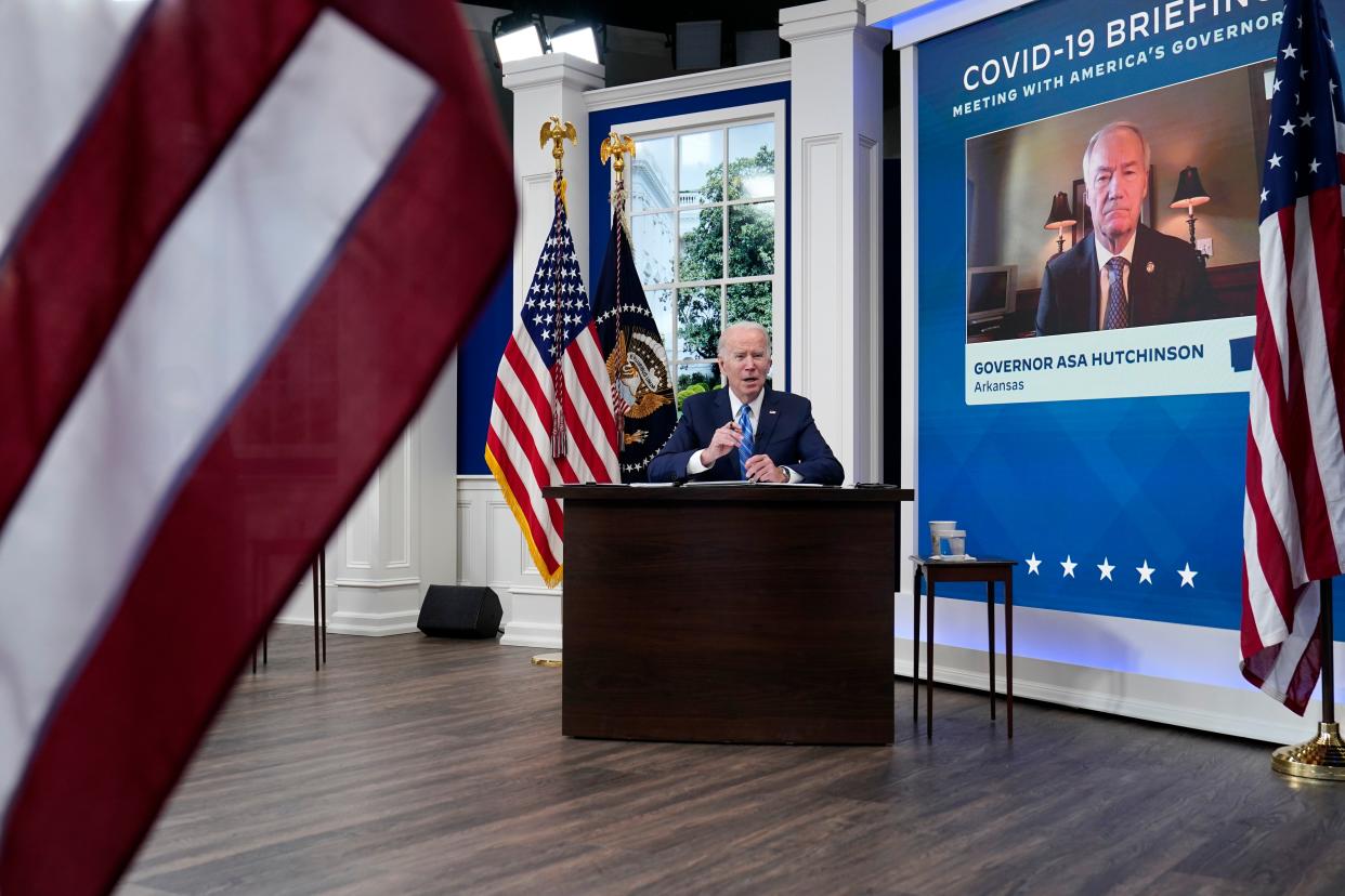 President Joe Biden participates in the White House COVID-19 Response Team's regular call with the National Governors Association in the South Court Auditorium in the Eisenhower Executive Office Building on the White House Campus on Monday, Dec. 27, 2021, in Washington.