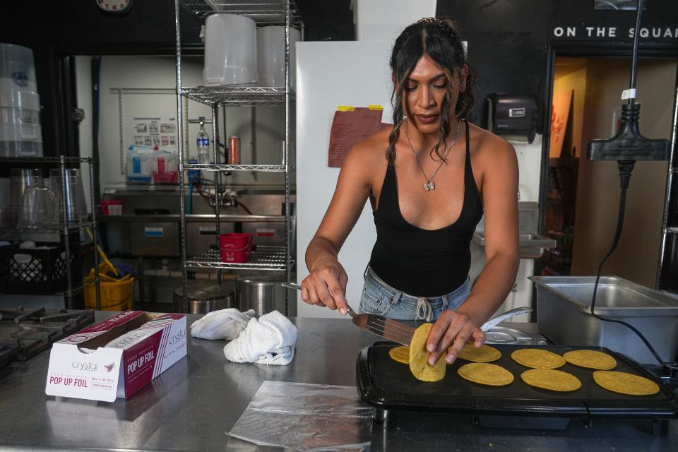 Owner Alexis Tovías Morales makes fresh tortillas July 29 in the kitchen of Barbs-B-Q.