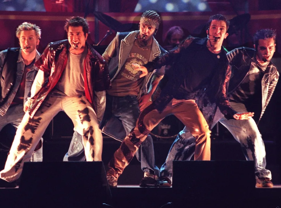 <p>2. But wait, Lance wasn't the first fifth member of 'N Sync!</p> <p>That role was originally played by <strong>Jason Galasso</strong>, who had known Fatone from choir in their high school days and was dabbling in the singing-group arts when he got a page (1990s, FTW) out of nowhere from his old acquaintance. Coincidentally, he also knew Chasez because, as Galasso <a href="https://www.youtube.com/watch?v=CSuXeeRAqv0" rel="nofollow noopener" target="_blank" data-ylk="slk:explained on The Digital Get Down;elm:context_link;itc:0;sec:content-canvas" class="link ">explained on <em>The Digital Get Down</em></a> podcast in 2019, he "used to kind of hang out with <em>The Mickey Mouse Club</em>" stars like <strong>Chase Hampton</strong> and <strong>Keri Russell</strong>.</p> <p>After they "locked in perfectly" on a rendition of <strong>Boyz II Men</strong>'s "End of the Road," that was it, he was in the as-yet unnamed group. "I remember I'm like, 'Dang, Justin's young!'" he recalled. "But then I heard him sing, I'm like 'Oh, it doesn't matter how old he is, he can sing his butt off."</p> <p>At the same time, however, the bass singer was also in a three-man group called Unreal, "so I'm still trying to decide, you know, what I want to do, what direction I want to go in as far as which group I want to go with," Galasso, who's <a href="https://www.instagram.com/jasongalasso72/" rel="nofollow noopener" target="_blank" data-ylk="slk:in the mortgage loan business;elm:context_link;itc:0;sec:content-canvas" class="link ">in the mortgage loan business</a> these days, recalled. "Because I remember, the first time Lou Pearlman brought over some music, he was thinking about the type of music that we would be doing, and I come from an R&B, hip-hop background. That's my love, my heart, my soul."</p> <p>So when Pearlman came over with "this European-style techno, I was just like, 'Hmm, okay.'" So, he went ahead and traveled with the other guys in Unreal to Atlanta to cut a demo, which he thought turned out great.</p> <p>Meanwhile, 'N Sync was starting to fashion a look and they were talking about putting a showcase together for Disney's Pleasure Island. They even took a field trip to <strong>Shaquille O'Neal</strong>'s house to check out his home studio in Orlando, but they had not yet recorded any music. And, more consequentially for Galasso, they hadn't yet signed any contracts.</p> <p>Pretty soon, both groups were trying to get him to sign. Galasso said he took the dueling contracts to a lawyer and, while the deal with the trio was pretty standard issue, Pearlman had himself written into the 'N Sync contract as a sixth member, and that contract was "thick as a phone book." He felt that the other members of 'N Sync were more gung-ho than he was about the deal—which was true, because they all proceeded to sign it, whether they truly understood what it entailed or not.</p> <p>So Galasso ultimately went with the group that wasn't 'N Sync.</p>