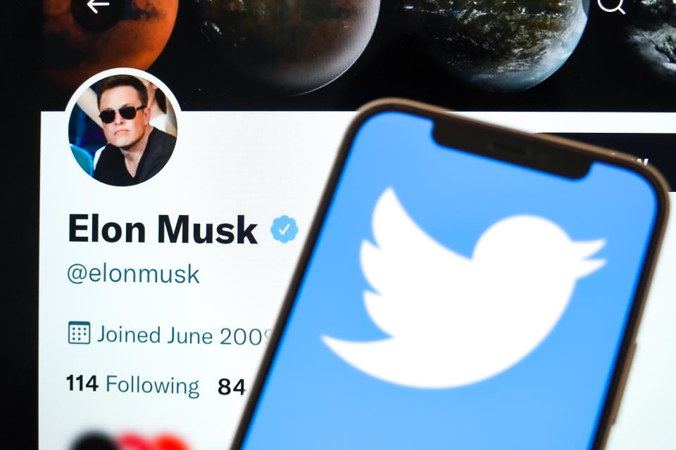 CHINA - 2022/04/26: In this photo illustration, the Twitter logo is displayed on the screen of the phone, with Elon Musk's Twitter account in the background. (Photo Illustration by Sheldon Cooper/SOPA Images/LightRocket via Getty Images)