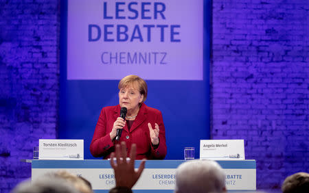 German Chancellor Angela Merkel speaks during the meeting with readers of 'Freie Presse' newspaper in Chemnitz, Germany, November 16, 2018. Kay Nietfeld/Pool via REUTERS