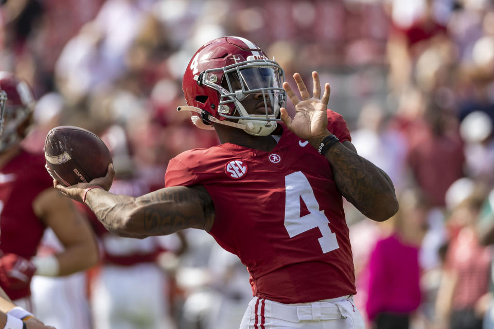 Alabama quarterback Jalen Milroe (4) warms up before an NCAA college football game against Tennessee, Saturday, Oct. 21, 2023, in Tuscaloosa, Ala. (AP Photo/Vasha Hunt)