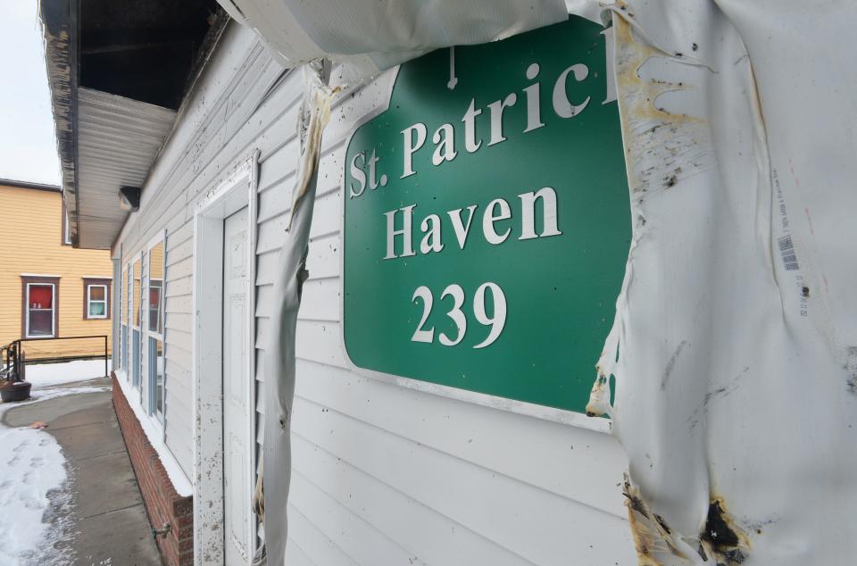 Melted siding from fire damage is shown at St. Patrick's Haven is shown in Erie in this file photo taken on Nov. 18, 2022. The restored shelter is now marking its 40th year of service.