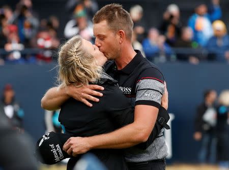 Sweden's Henrik Stenson kisses his wife Emma after winning the British Open golf championship at Royal Troon, Scotland, Britain - 17/07/2016. REUTERS/Craig Brough