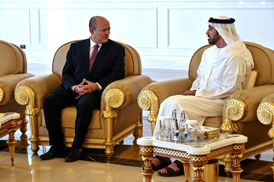 President of the United Arab Emirates Sheikh Mohammed Bin Zayed greets Israeli Prime Minister Naftali Bennett on his arrival to Abu Dhabi, United Arab Emirates, Thursday, June 9, 2022. The visit was Bennett's second public trip to Abu Dhabi since Israel and the UAE agreed to normalize ties in 2020 after years of quiet cooperation, mainly over their shared concerns over Iran's nuclear capabilities. (Israeli Government Press Office via AP)