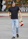 <p>Cody Simpson makes a quick stop for snacks while out in L.A. on Tuesday.</p>