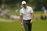 Rory McIlroy, of North Ireland, reacts after missing a putt on the =7th hole during a practice round for the PGA Championship golf tournament, Tuesday, May 17, 2022, in Tulsa, Okla. (AP Photo/Matt York)