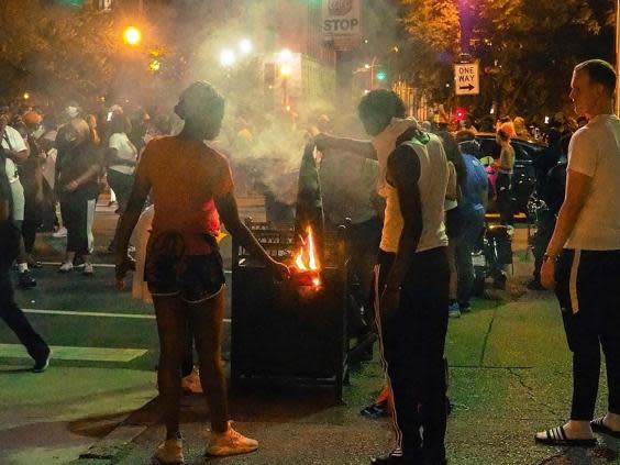 Demonstrators gather in downtown Louisville, Ky., to protest the killing of Breonna Taylo (AP)