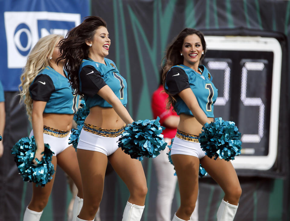 <p>Jacksonville Jaguars cheerleaders perform during the first half of an NFL football game against the Cincinnati Bengals, Sunday, Nov. 5, 2017, in Jacksonville, Fla. (AP Photo/Stephen B. Morton) </p>