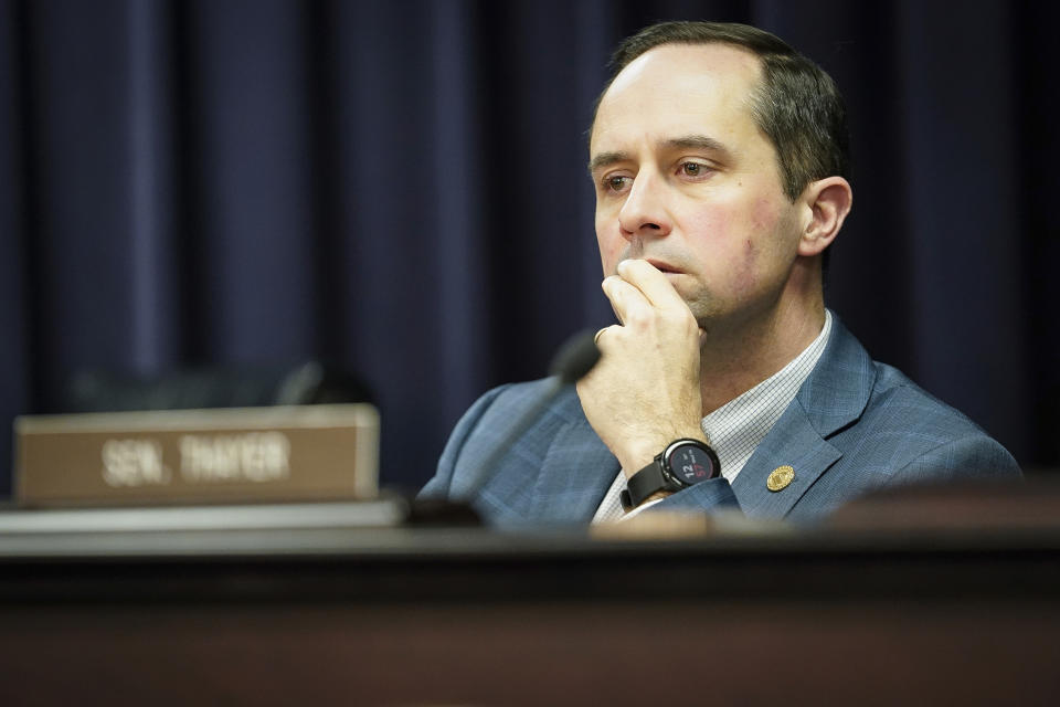 FILE - Kentucky Republican state Sen. Chris McDaniel listens to testimony during a State and Local Government Committee meeting at the state capitol in Frankfort, Ky., on Feb. 19, 2020. A Republican-led push to phase out Kentucky's individual income tax hit a snag when a fiscal trigger wasn't met to keep it shrinking in 2025, but key lawmakers say that means it's working exactly as intended. (AP Photo/Bryan Woolston, File)