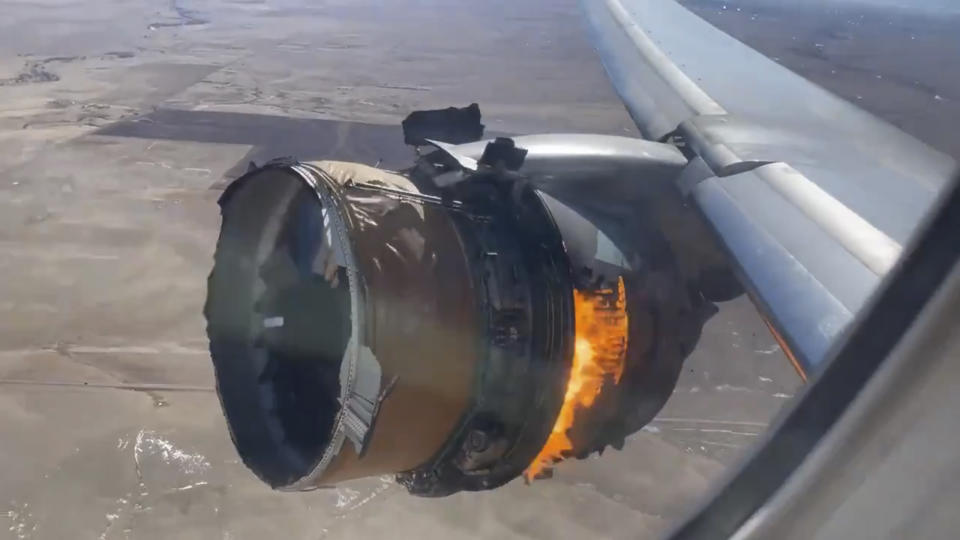 FILE - In this image taken from video, the engine of United Airlines Flight 328 is on fire after after experiencing a "right-engine failure" shortly after takeoff from Denver International Airport, Saturday, Feb. 20, 2021, in Denver. The Federal Aviation Administration has ordered airlines in the United States to ground planes with the type of engine that blew apart after takeoff from Denver this past weekend until they can be inspected for stress cracks. The order applies to airplanes equipped with certain Pratt & Whitney engines, which are used solely on Boeing 777s. (Chad Schnell via AP, File)