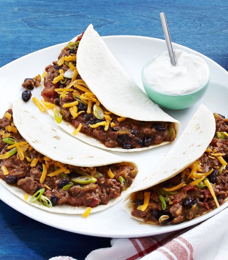 <p>These easy Mexican <a href="https://www.delish.com/uk/cooking/recipes/a30747470/beef-taco-boats-recipe/" rel="nofollow noopener" target="_blank" data-ylk="slk:beef tacos;elm:context_link;itc:0;sec:content-canvas" class="link ">beef tacos</a> are the best. </p><p>Get the <a href="https://www.delish.com/uk/cooking/recipes/a31032847/cheesy-ground-beef-tacos-recipe/" rel="nofollow noopener" target="_blank" data-ylk="slk:Cheesy Beef Tacos;elm:context_link;itc:0;sec:content-canvas" class="link ">Cheesy Beef Tacos</a> recipe.</p>