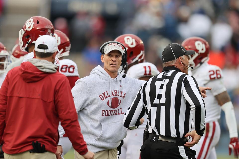 Nov 18, 2023; Provo, Utah, USA; Oklahoma Sooners head coach Brent Venables gives instructions against the Brigham Young Cougars in the second quarter at LaVell Edwards Stadium. Mandatory Credit: Rob Gray-USA TODAY Sports