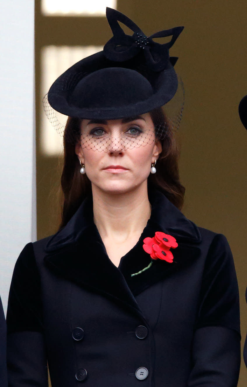 The Duchess of Cambridge wore an all-black ensemble, including an Alexander McQueen coat and Sylvia Fletcher for Lock & Co. hat, to attend the Remembrance Sunday Service in London on November 8, 2015.