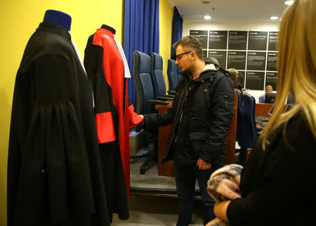 Students are seen at the original courtroom of the United Nations International Criminal Tribunal for the former Yugoslavia (ICTY), as a part of their education, in Sarajevo City Hall, Bosnia and Herzegovina December 7, 2018. Picture taken December 7, 2018. REUTERS/Dado Ruvic