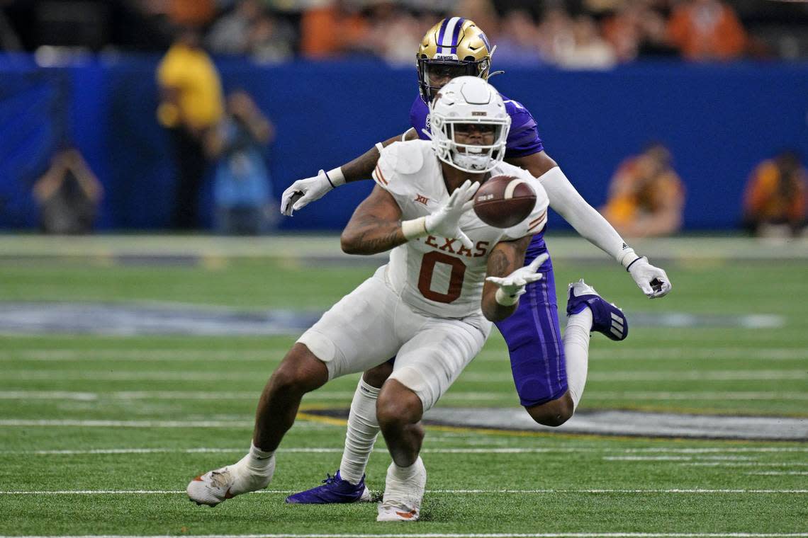 Jan 1, 2024; New Orleans, LA, USA; Texas Longhorns tight end Ja’Tavion Sanders (0) makes a catch during the third quarter against the Washington Huskies in the 2024 Sugar Bowl college football playoff semifinal game at Caesars Superdome. Mandatory Credit: Matthew Hinton-USA TODAY Sports