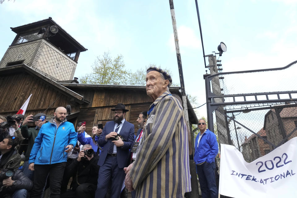 CAPTION CORRECTS THE NAME - Auschwitz Survivor from U.S. Edward Mosberg speaks to media before the March of the Living annual observance that was not held for two years due to the global COVID-19 pandemic, in Oswiecim, Poland, Thursday, April 28, 2022. Only eight survivors and some 2,500 young Jews and non-Jews are taking part in the annual march that is scaled down this year because of the war in neighboring Ukraine that is fighting Russia's invasion. (AP Photo/Czarek Sokolowski)