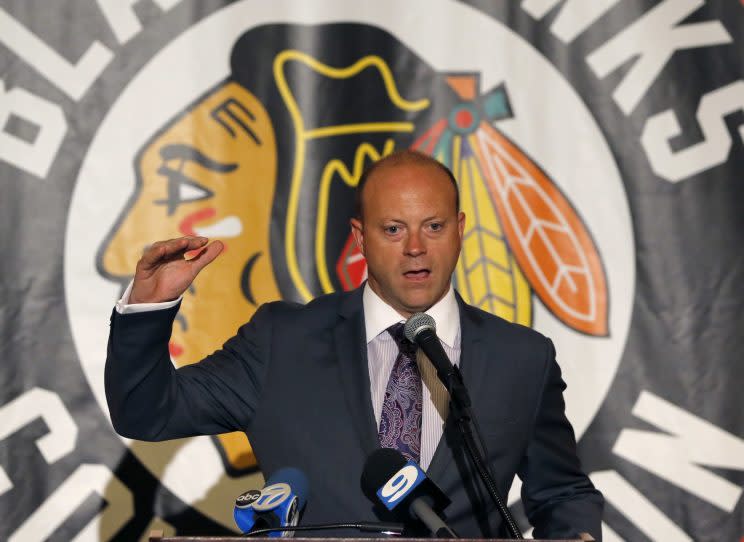 Chicago Blackhawks' general manager Stan Bowman responds to a question from reporters during the Blackhawks' NHL Convention Friday, July 15, 2016, in Chicago. (AP Photo/Charles Rex Arbogast)