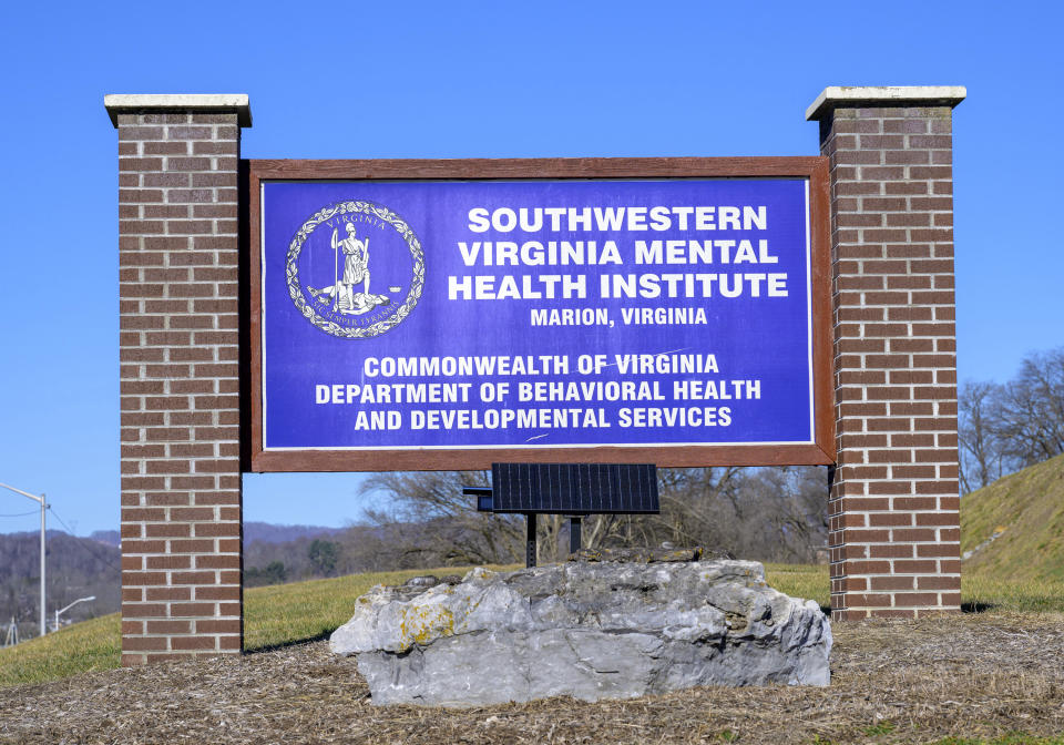 The sign for the Southwestern Virginia Mental Health Institute is shown, Monday, Feb. 5, 2024, in Marion, Va. There's consensus in Virginia that the mental health care system is in need of reform, due to what Gov. Glenn Youngkin’s administration says is an over-reliance on hospitalization at a time of growing need. (AP Photo/Earl Neikirk)