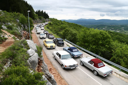 Oldtimer Mercedes cars are seen driving in Imotski, Croatia, May 19, 2019. REUTERS/Antonio Bronic