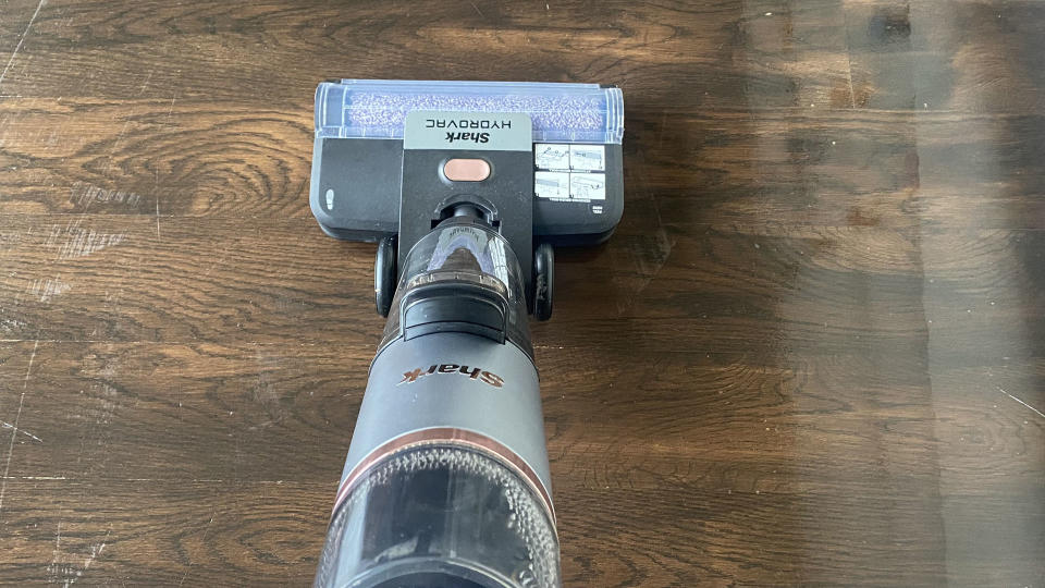 Shark HydroVac Cordless floor cleaner on a wooden floor