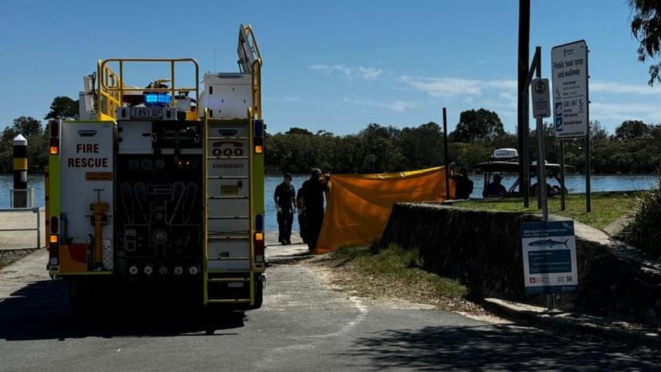 Police were assisted by firefighters and paramedics in retrieving the body. Picture: Seven ,A body has been found floating on the Maroochy River on Queensland's Sunshine Coast. Picture: Seven