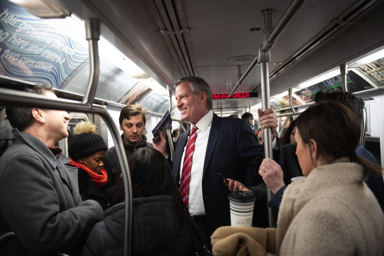 Mayor Bill de Blasio rides the Subway to City Hall from the Franklin Avenue stop in Brooklyn inform riders of a new plan to fund the MTA on March 7, 2019.