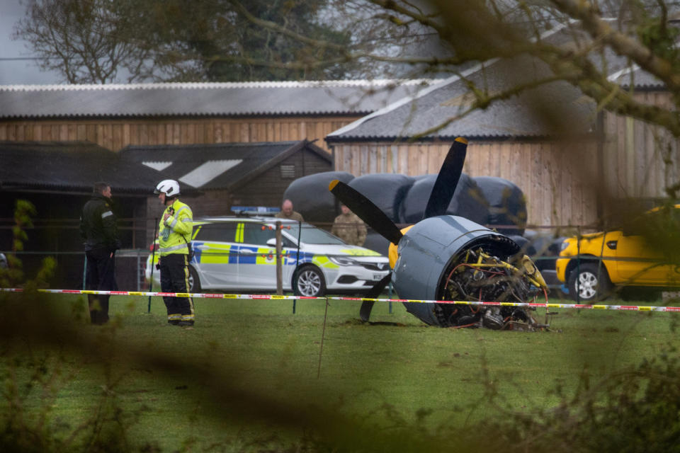 The scene in Limington, Somerset where a plane has crashed in to a field. 28 April 2021.  See SWNS story SWBRplane.  Emergency services have rushed to a field after a heritage WW2 plane crashed.  At least two police vehicles, two ambulances and two fire engines have been called to Limington, Somerset, this afternoon (April 28).  Pictures from the scene show a Hawker Sea Fury aircraft's propeller separated from the wreckage in a field near Church Street.  The crash site is within a mile of Royal Naval Air Station Yeovilton, on Heathcote Road.   The Navy Wings charity, which flies historic warbirds, has posted on its Facebook page: 