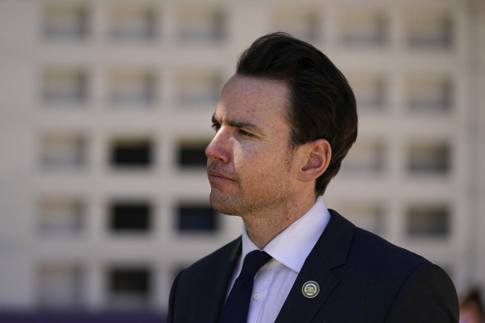 FILE - Assemblyman Kevin Kiley conducts an interview during a campaign stop outside of Manual Arts High School on Sept. 13, 2021, in Los Angeles. Kiley, a state legislator who became a conservative favorite for his pointed and relentless criticism of Democratic Gov. Gavin Newsom, captured a U.S. House seat 3rd District, in northeastern California. (AP Photo/Marcio Jose Sanchez,File)