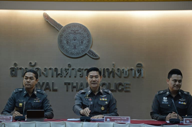 Thai Major General Songpol Wattanachai (C) holds a press conference at the Royal Thai Police headquarters in Bangkok on December 4, 2015