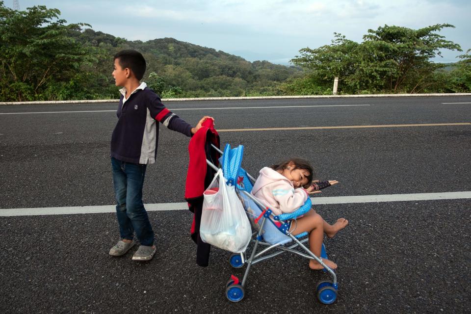 Two children who are part of the migrant caravan of Central American refugees that the president claims are attempting to invade the U.S. The caravan is currently stuck in southern Mexico. (Photo: GUILLERMO ARIAS via Getty Images)