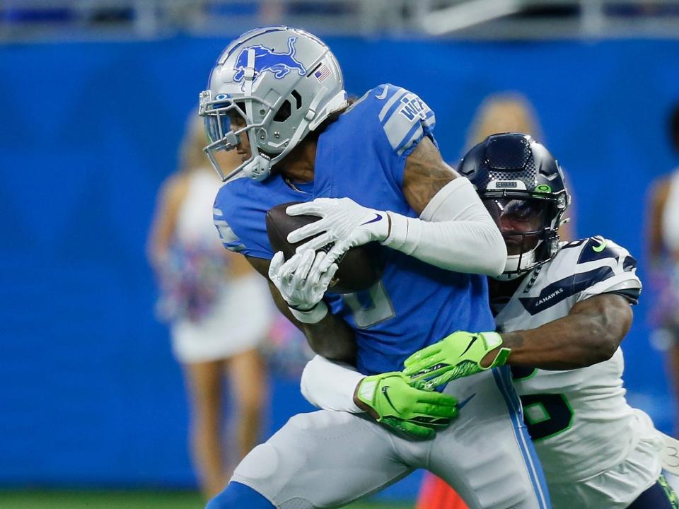 Josh Reynolds makes a catch against the Seattle Seahawks.