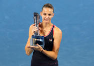 Tennis - Brisbane International - Women's Final - Pat Rafter Arena, Brisbane, Australia, January 6, 2019 Czech Republic's Karolina Pliskova celebrates with the trophy after winning the final against Ukraine's Lesia Tsurenko REUTERS/Patrick Hamilton