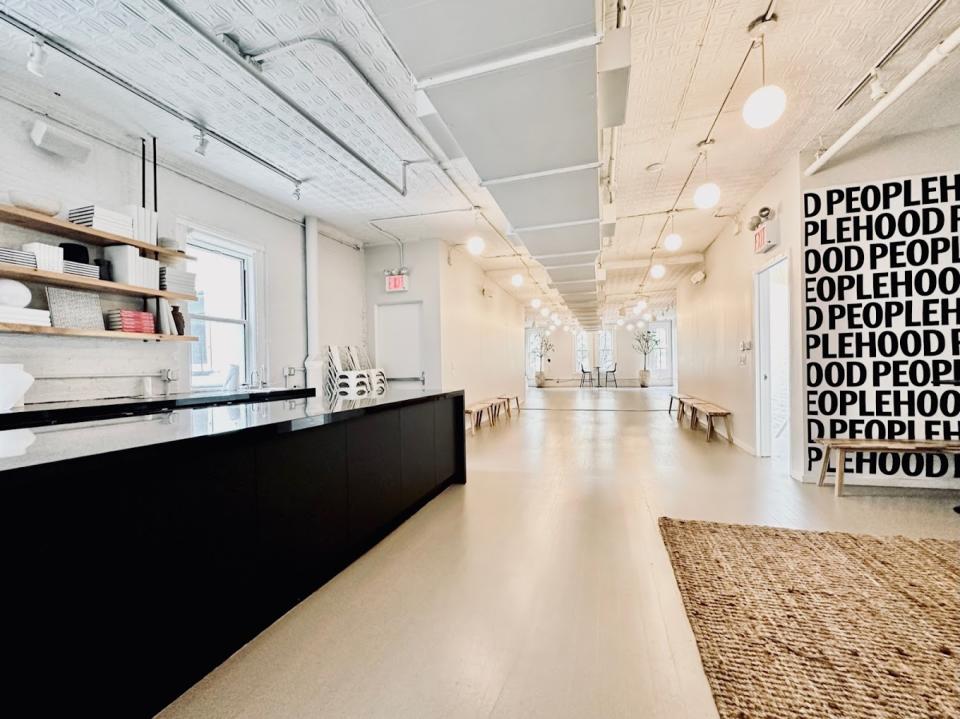 The interior lobby and cafe at Peoplehood, a wellness studio in Manhattan.