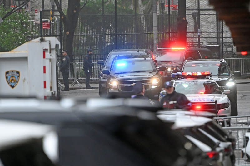 The motorcade carrying former United States President Donald Trump arrives at Manhattan criminal court on Thursday in New York. Photo by Louis Lanzano/UPI