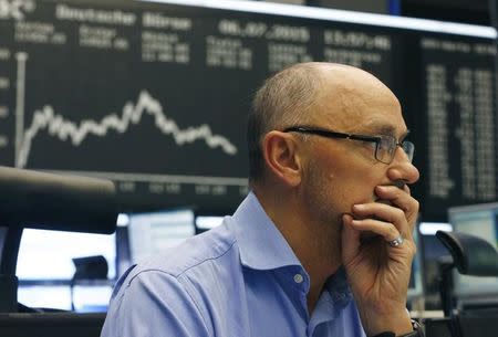 A trader works at the Frankfurt stock exchange, Germany, July 6, 2015. REUTERS/Ralph Orlowski/Files