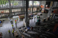 Construction continues in the main entrance of the UBS Arena, the future home of the New York Islanders NHL hockey team, in Elmont, N.Y., Thursday, June 3, 2021. The building will have all the bells and whistles and be better accessible to Islanders fans than the recent temporary home in Brooklyn, and the hope is it will provide a strong home-ice advantage for decades to come. (AP Photo/Seth Wenig)