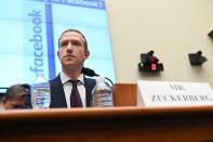 FILE PHOTO: Facebook Chairman and CEO Zuckerberg testifies at a House Financial Services Committee hearing in Washington