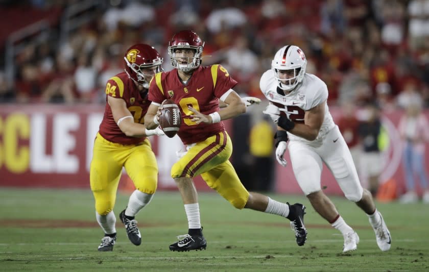 Southern California quarterback Kedon Slovis (9) carries against Stanford during the first half of an NCAA college football game Saturday, Sept. 7, 2019, in Los Angeles. (AP Photo/Marcio Jose Sanchez)