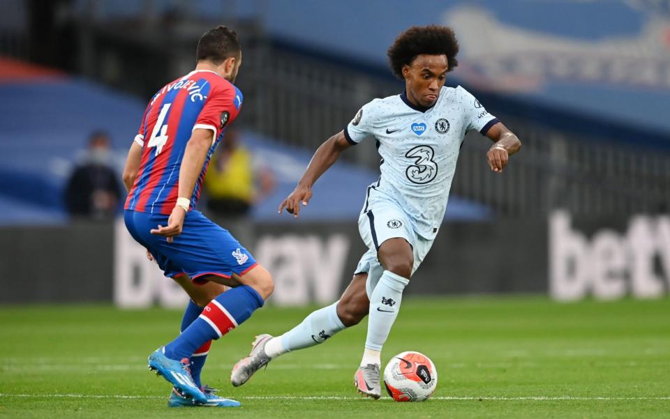 Luka Milivojevic of Crystal Palace puts pressure on Willian of Chelsea during the Premier League match between Crystal Palace and Chelsea FC at Selhurst Park - Darren Walsh/Chelsea FC via Getty Images