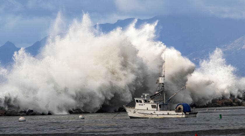 REDONDO BEACH, CA-DECEMBER 30, 2023:A large wave crashes over the rocks as viewed from the Redondo Beach Pier. A high surf warning and a coastal flood warning was issued by the National Weather Service for all Los Angeles County beaches. (Mel Melcon / Los Angeles Times)