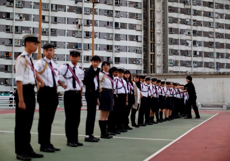 The Wider Image: Sermons with saline: Hong Kong pastor offers aid and prayers